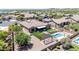 Overhead view of a fenced yard offering a refreshing pool, a covered patio, and artificial grass at 12710 W Forest Pleasant Pl, Peoria, AZ 85383