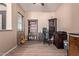 Home office with functional furniture, built-in storage, and hardwood floors at 12710 W Forest Pleasant Pl, Peoria, AZ 85383