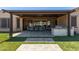 Outdoor living with a covered patio, built-in grill, and ample seating area at 12710 W Forest Pleasant Pl, Peoria, AZ 85383