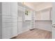 Spacious walk-in closet with built-in shelving and ample storage space at 12710 W Forest Pleasant Pl, Peoria, AZ 85383