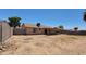 Expansive backyard featuring a large perimeter wall with plenty of space to design your own outdoor oasis at 1414 W Monona Dr, Phoenix, AZ 85027