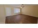 Bright living room with luxury vinyl plank flooring, updated fixtures, and a large window at 1414 W Monona Dr, Phoenix, AZ 85027