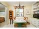 Dining room features a mosaic-style table, chandelier, and built-in cabinets at 1441 E Hubbell St, Phoenix, AZ 85006