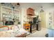Bright kitchen with built-in shelves, modern appliances, and a tiled floor at 1441 E Hubbell St, Phoenix, AZ 85006