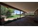 Covered back patio overlooking green backyard and desert landscaping providing scenic views at 1844 W Virginia Ave, Phoenix, AZ 85007