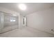 Bedroom featuring a mirrored closet and neutral carpet at 1844 W Virginia Ave, Phoenix, AZ 85007
