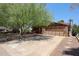 Charming home featuring a large, mature tree providing ample shade in the front yard at 1844 W Virginia Ave, Phoenix, AZ 85007