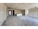 Under construction large living room and unfinished walls and floors at 18751 W Monterosa St, Litchfield Park, AZ 85340