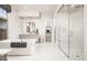 Modern bathroom with soaking tub, walk-in shower, and large window allowing for ample natural light at 22673 E San Tan Blvd, Queen Creek, AZ 85142