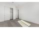 This bedroom features neutral carpet, a closet and white paint at 31476 N Hayweather Ln, San Tan Valley, AZ 85143