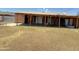 View of the home's backyard with a covered patio area that has access to the home at 3937 W Stella Ln, Phoenix, AZ 85019