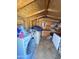 This shed is used for storage and has a washing machine and dryer inside at 3937 W Stella Ln, Phoenix, AZ 85019
