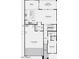Detailed first floor plan featuring a two car garage, kitchen, dining area, and access to a covered patio at 3944 E Ghost Flower Ln, San Tan Valley, AZ 85140