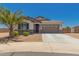 Beautiful single-story home featuring desert landscaping, stone accents and a spacious two-car garage at 40913 W Williams Way, Maricopa, AZ 85138
