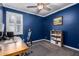 Office with blue walls, ceiling fan, window, and carpet at 40913 W Williams Way, Maricopa, AZ 85138