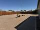 Spacious backyard with gravel and block planters at 433 S 113Th Pl, Mesa, AZ 85208