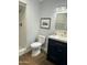 Updated bathroom features new vanity with granite countertop and custom tiled shower at 433 S 113Th Pl, Mesa, AZ 85208