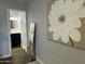 View through doorway to renovated bathroom with modern fixtures and beautiful decor at 433 S 113Th Pl, Mesa, AZ 85208