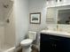 Updated bathroom features new vanity with granite countertop and custom tiled shower at 433 S 113Th Pl, Mesa, AZ 85208