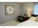 Cozy bedroom featuring natural light, modern decor and a comfortable chair at 433 S 113Th Pl, Mesa, AZ 85208