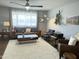 Open floor plan, living room with large window, modern furnishings and decor at 433 S 113Th Pl, Mesa, AZ 85208