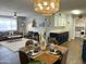 Open floor plan showcasing the seamless flow between the living room and dining area at 433 S 113Th Pl, Mesa, AZ 85208