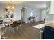 Spacious living space, seamlessly connected dining and kitchen areas at 433 S 113Th Pl, Mesa, AZ 85208