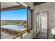 Bathroom features a view and a modern design with concrete accent wall at 4925 E Red Rock Dr # 43, Phoenix, AZ 85018