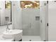 Sleek bathroom featuring vessel sink, mosaic tile shower with glass door, and natural light at 4925 E Red Rock Dr # 43, Phoenix, AZ 85018