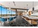 Dining area featuring a large table with seating and expansive windows showcasing city views at 4925 E Red Rock Dr # 43, Phoenix, AZ 85018