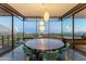 Dining room with stylish lighting, chairs and panoramic views of the valley at 4925 E Red Rock Dr # 43, Phoenix, AZ 85018
