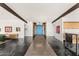 Bright entryway featuring a blue door, striking artwork, black tile floors, and custom millwork at 4925 E Red Rock Dr # 43, Phoenix, AZ 85018