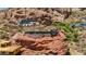 Desert residence surrounded by red rocks and greenery, featuring clean lines and ample natural light at 4925 E Red Rock Dr # 43, Phoenix, AZ 85018
