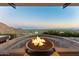 Beautiful outdoor seating area with a firepit and spectacular city views at 4925 E Red Rock Dr # 43, Phoenix, AZ 85018