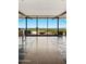 Spacious foyer with sleek flooring, and expansive windows showcase an outdoor fire pit and city view at 4925 E Red Rock Dr # 43, Phoenix, AZ 85018