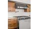Kitchen showcasing stainless steel range and hood and marble countertops at 4925 E Red Rock Dr # 43, Phoenix, AZ 85018