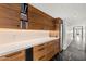 Modern kitchen features custom wood cabinets, a white countertop, and sleek appliances at 4925 E Red Rock Dr # 43, Phoenix, AZ 85018