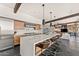 Bright kitchen with expansive island, stone floors, modern cabinets, and stainless appliances at 4925 E Red Rock Dr # 43, Phoenix, AZ 85018