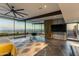 Spacious main bedroom features a city view, modern ceiling fan and access to a balcony at 4925 E Red Rock Dr # 43, Phoenix, AZ 85018
