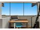 Bright home office space with a modern desk, comfortable chair, and a view of the surrounding landscape at 4925 E Red Rock Dr # 43, Phoenix, AZ 85018