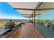 Well-appointed outdoor kitchen with a grill and counter space, perfect for outdoor gatherings with scenic views at 4925 E Red Rock Dr # 43, Phoenix, AZ 85018