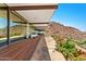 Elegant outdoor patio with stylish seating and beautiful landscaping and mountain views at 4925 E Red Rock Dr # 43, Phoenix, AZ 85018