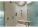 Modern walk-in shower with round skylight and tile design at 4925 E Red Rock Dr # 43, Phoenix, AZ 85018