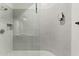 Modern shower with sleek glass doors, white penny tile, and contemporary fixtures, providing a spa-like experience at 4925 E Red Rock Dr # 43, Phoenix, AZ 85018