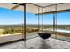 Expansive view from the main bedroom with desert landscaping and deck featuring a small pool at 4925 E Red Rock Dr # 43, Phoenix, AZ 85018