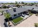Aerial view of the property showcasing the back yard with a patio, grill and hot tub at 6802 S 44Th Pl, Phoenix, AZ 85042