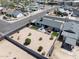 Aerial view of a spacious backyard featuring a patio, pergola, and fresh landscaping at 6802 S 44Th Pl, Phoenix, AZ 85042