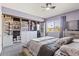 Bedroom featuring ceiling fan and built in closet at 6802 S 44Th Pl, Phoenix, AZ 85042