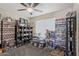 Bedroom featuring ceiling fan and shelves at 6802 S 44Th Pl, Phoenix, AZ 85042