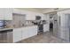 Updated kitchen features stainless steel appliances and stylish backsplash at 6802 S 44Th Pl, Phoenix, AZ 85042